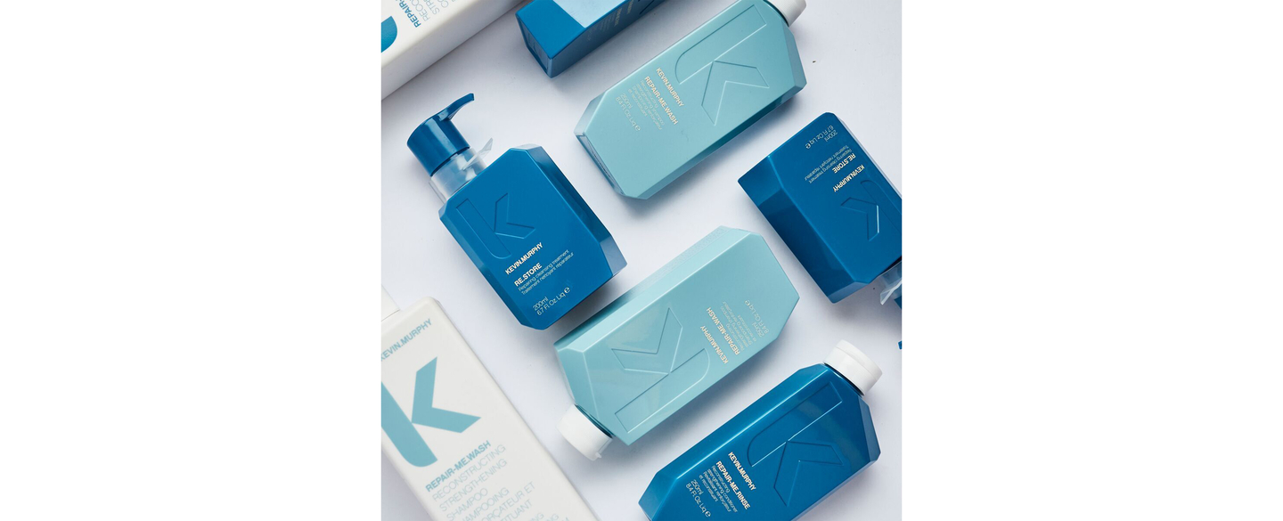Assorted KEVIN.MURPHY hair care products for damaged hair repair.